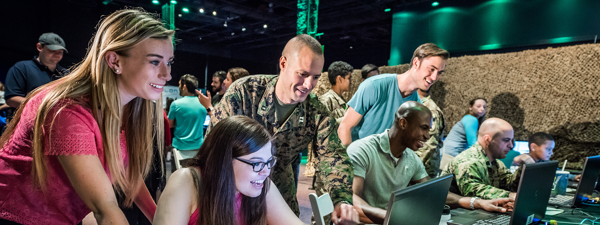 Guests test military simulators at the Otronicon technology event.