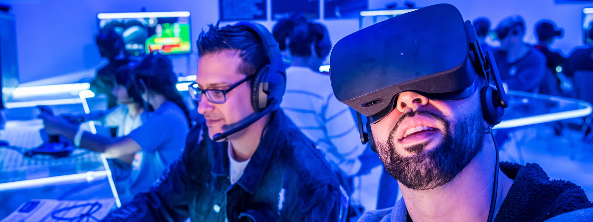 Visitors use virtual reality technology in the Flight Lab experience.