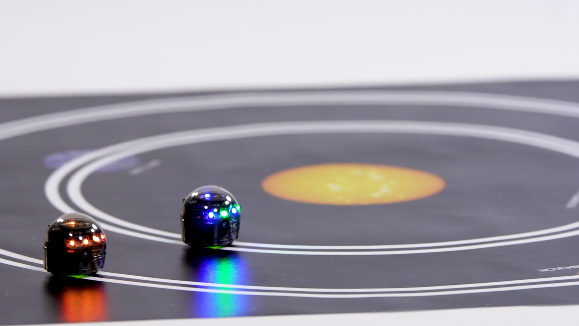 Mission: Mars Ozobots racing on the Mars Orbit activity mat.