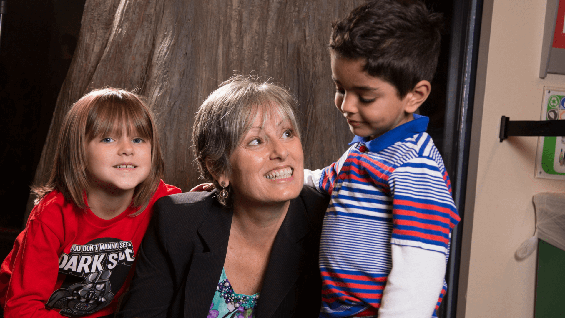 Group picture with one adult and two kids