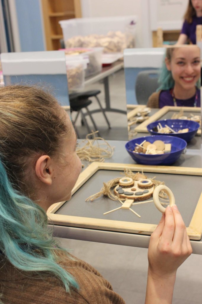 Create self portrait with loose play parts