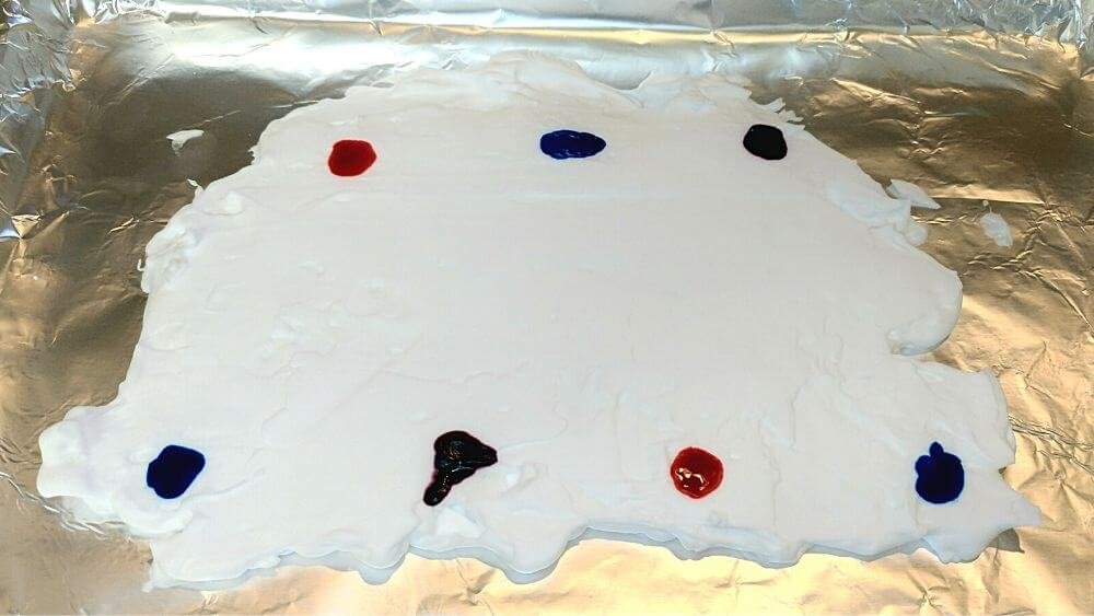 Add dye to shaving cream make marbleized paper