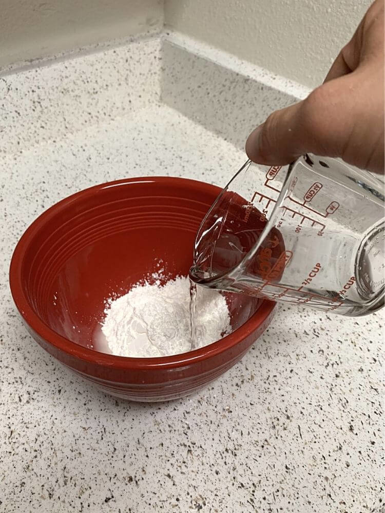 Add water to mixing bowl