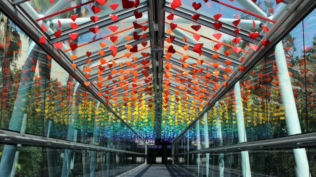 Pulse Nightclub Tribute Love Bridge to Orlando Science Center with a rainbow of origami hearts