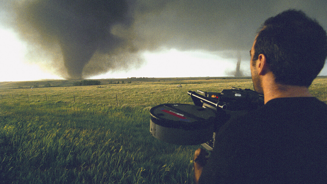 Forces of Nature - photo of tornado hunter filming two tornadoes