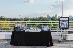 A table advertising The Ginger Officiant