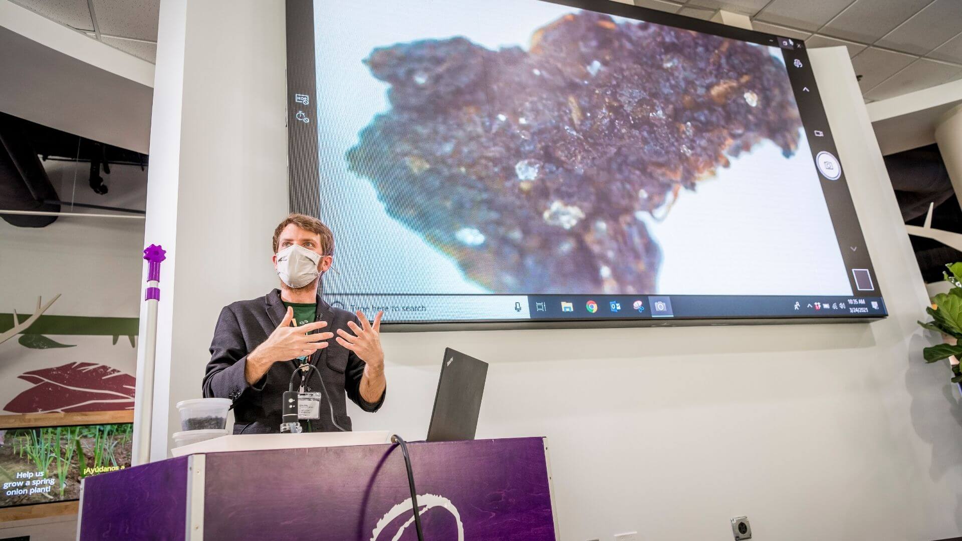Person doing demonstration in Orlando Science Center Food Heroes exhibit