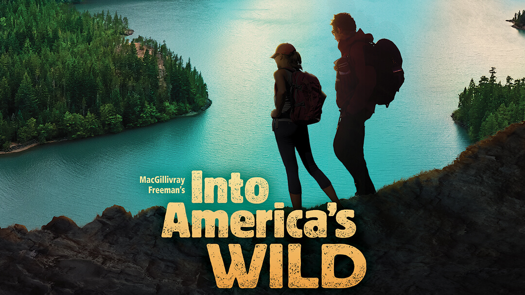 Into America's Wild Film – scene of two hikers on mountain above a lake.