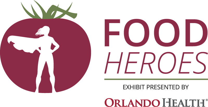 Food Heroes Exhibit Presented by Orlando Health - logo of superhero outline within tomato silhouette