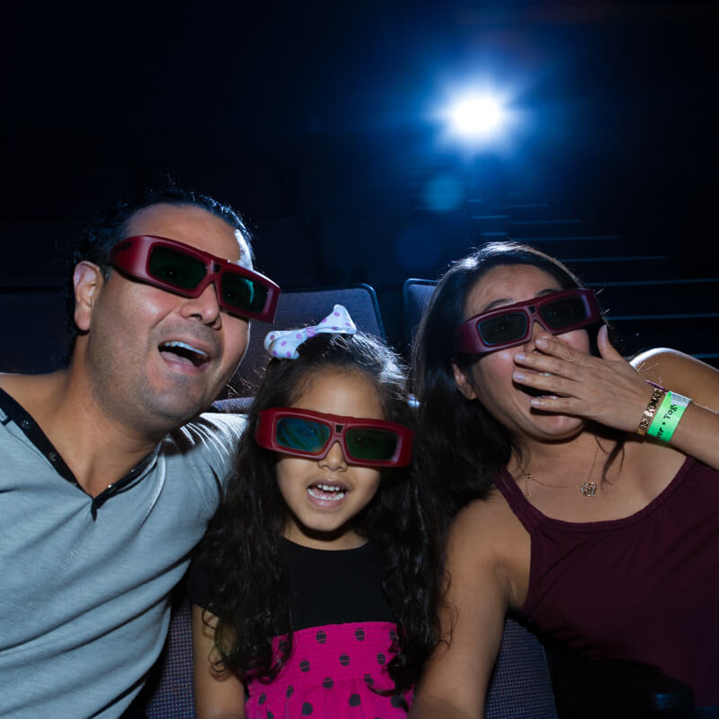 DAT_Family_800x800 Family of three in the Digital Adventure Theater.