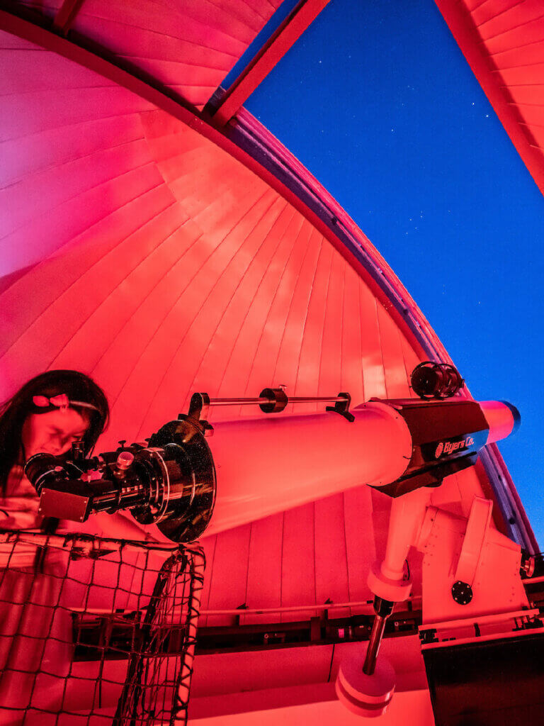 Guest using large telescope in the Observatory.