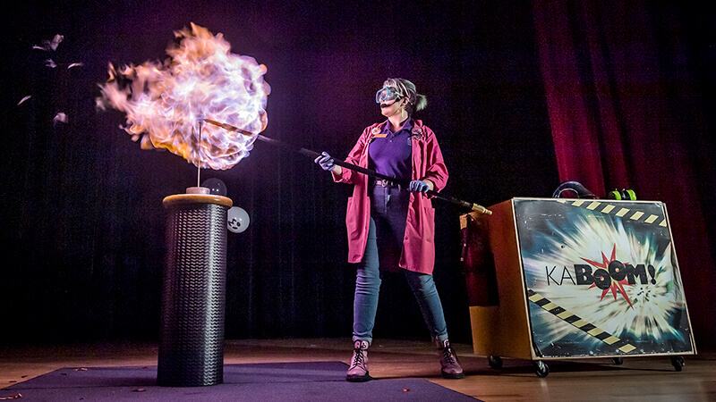 OSC_KABOOM-Show_800x450 Presenter creating large fireball explosion during KABOOM live stage show.