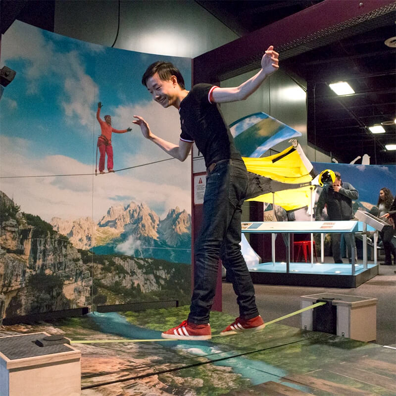 OSC_ExtremeSports__800x800_5 Young adult on balance rope in Extreme Sports exhibit.